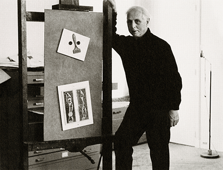 Max Ernst standing with the present work in Paris, 1964. Photo by Viktor Schamoni, courtesy of the estate of Peter Schamoni 